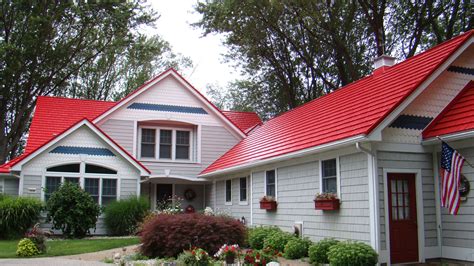 gray houses with red metal roofs|gray house with red trim.